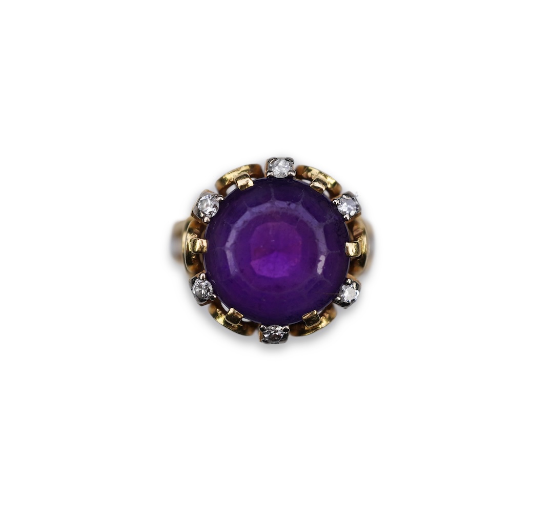 A stylish amethyst and diamond ring